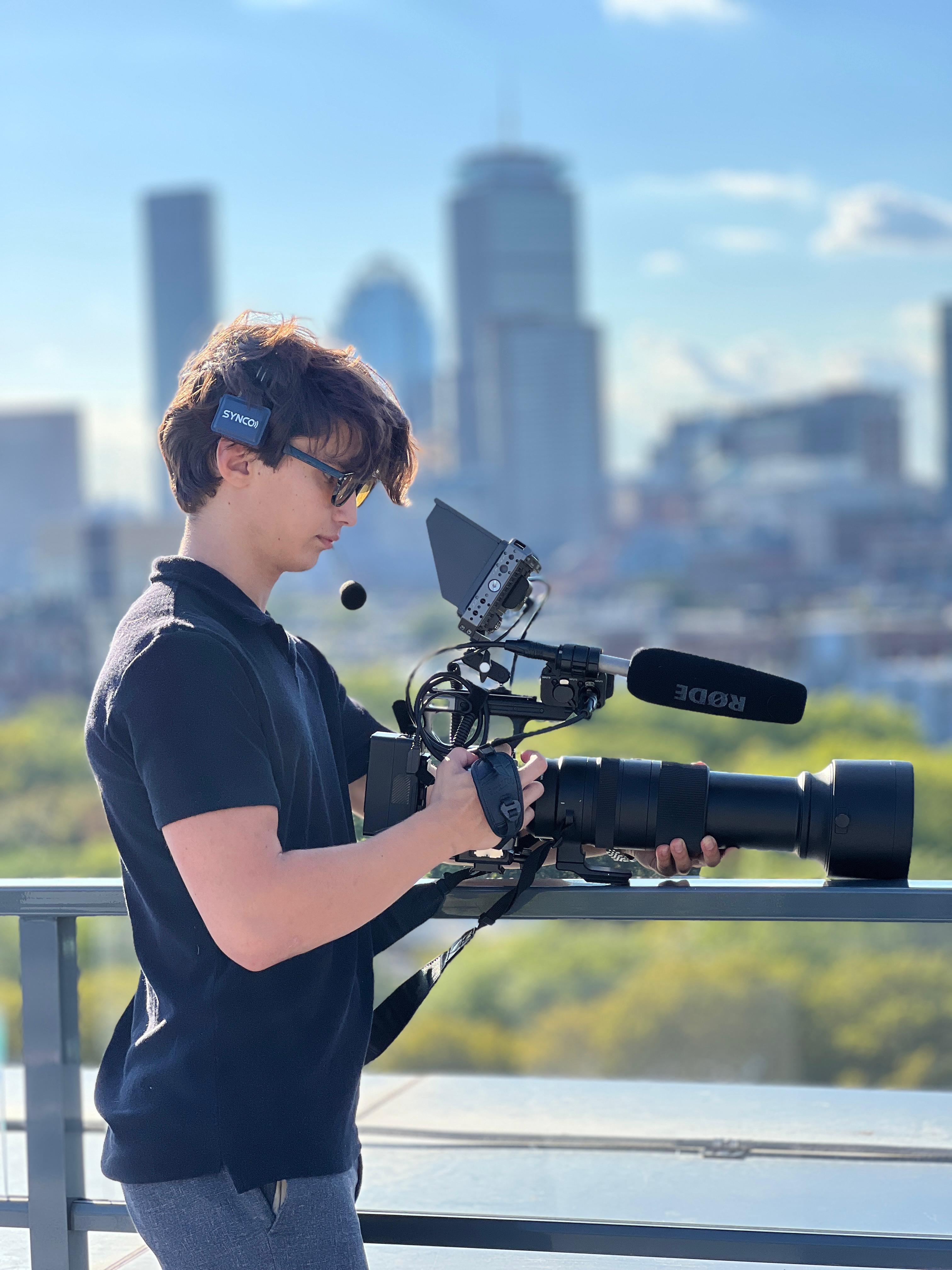 vivFilms camera operator filming on a rooftop